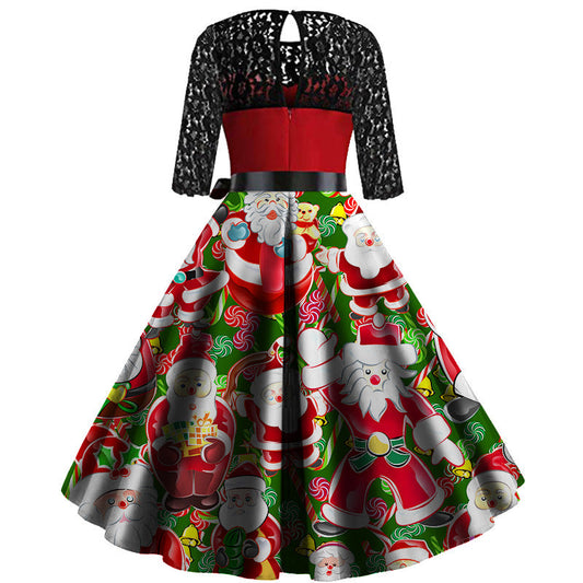 Kerstjurk met zwarte kanten mouwen, rood lijfje en wijde rok met kerstmanprint