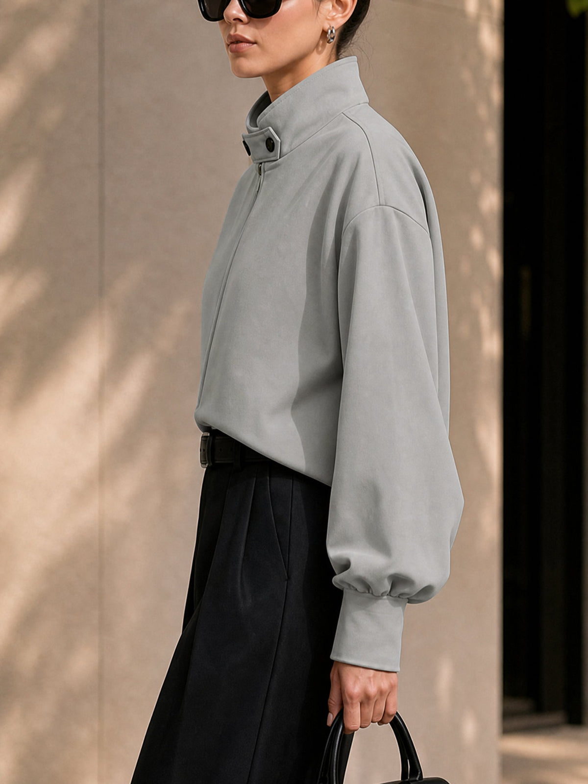 Oversized grijs damesjack met hoge opstaande kraag en rits