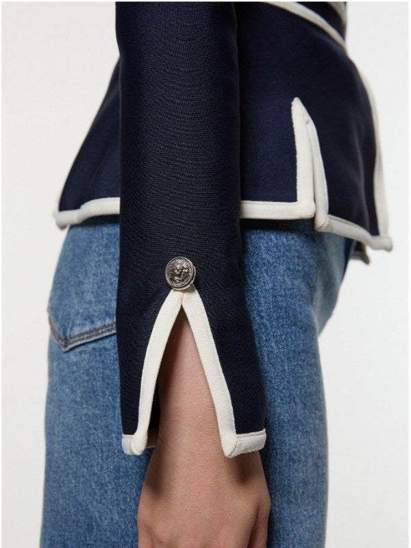 Marineblauw damesjack met crèmekleurige contrastbies en rits