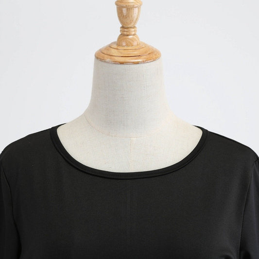 Swing kerstjurk voor dames met zwart bovenstuk, strikceintuur en kerstprint