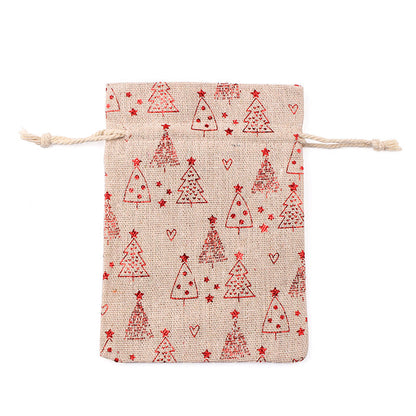 Kerstzakjes in jutelook met trekkoord en rode kerstprint met rendieren en sneeuwvlokken