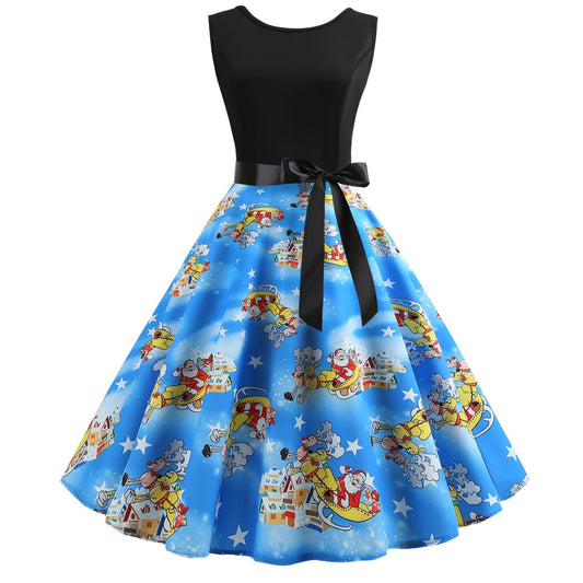 Mouwloze kerstjurk met zwart lijfje en blauwe rok met kerstman in de arrenslee