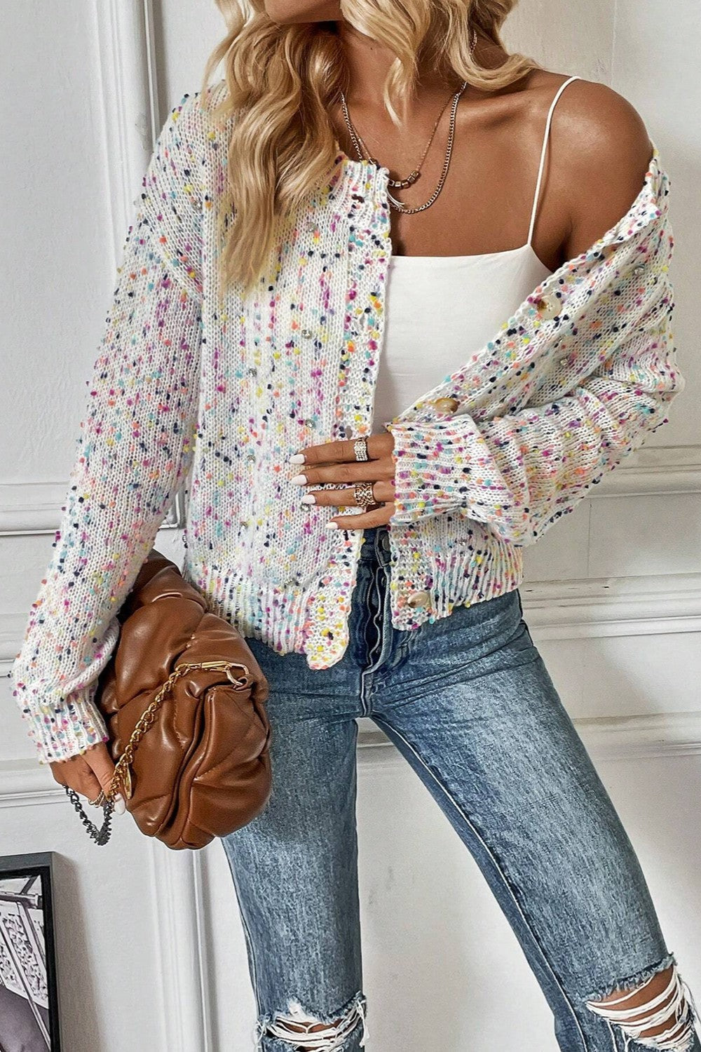 Gespikkeld vest dames met knopen - detailfoto