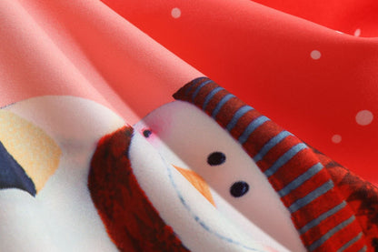 Kerstjurk voor dames met zwart bovenstuk, strik en rok met sneeuwpoppen