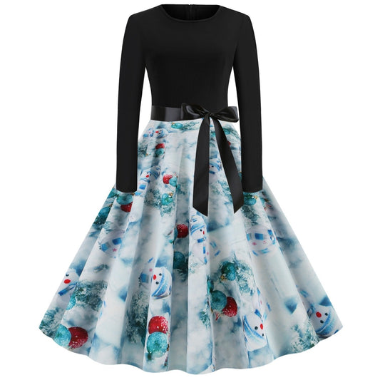 Swing kerstjurk voor dames met zwart bovenstuk, strikceintuur en kerstprint