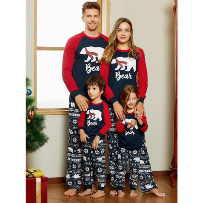 Kerstpyjama voor het hele gezin met ijsbeerprint en sneeuwvlokkenbroek