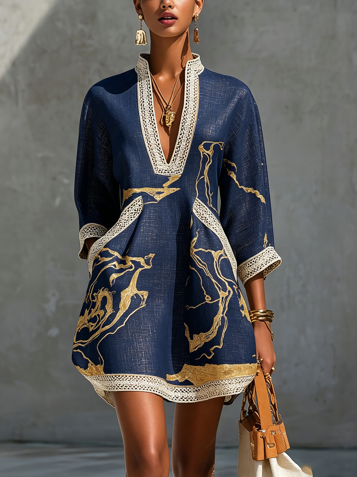 Tuniekjurk met gouden print en gehaakte bies in Marineblauw