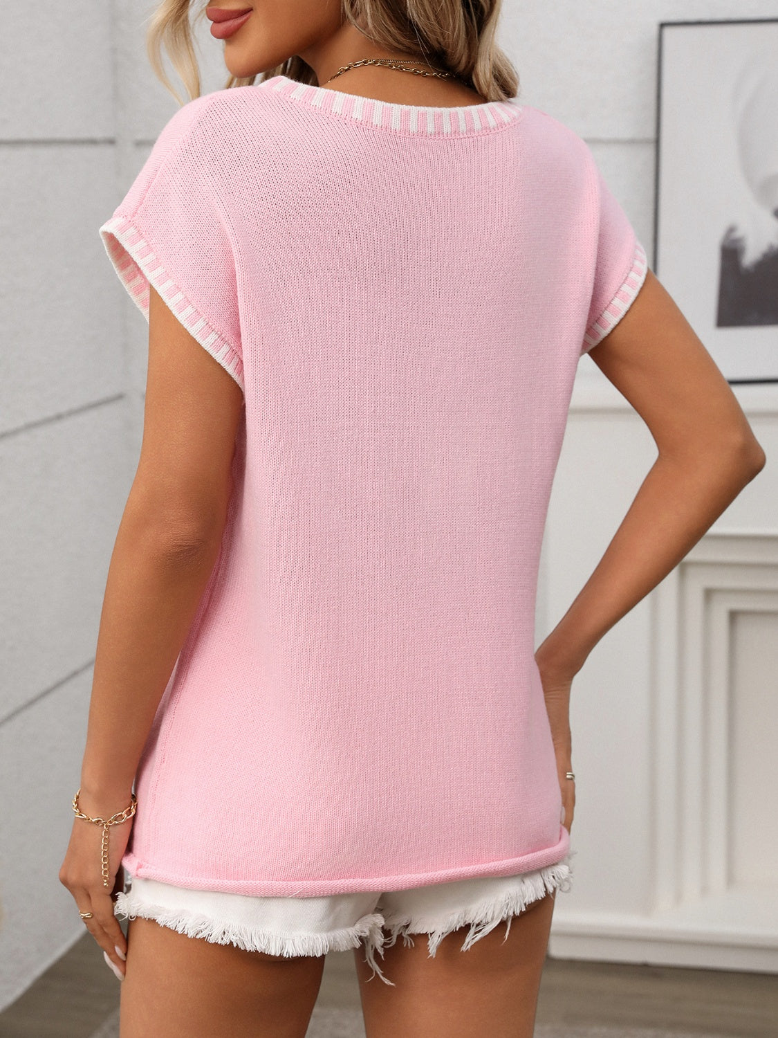 Gebreide top dames met contrastbies - detailfoto