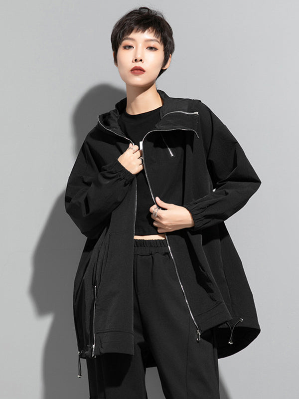 Oversized zwart damesjack met diagonale rits en capuchon