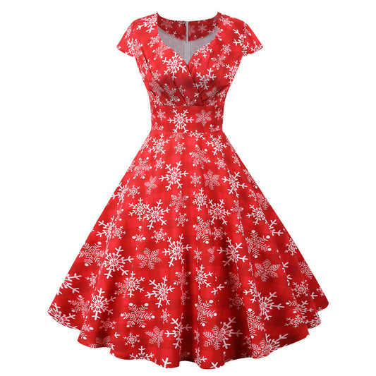 Swing kerstjurk voor dames met overslaghals, korte mouwen en wijde rok - rood met sneeuwvlokken