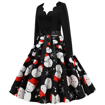 Zwarte vintage kerstjurk met geschulpte V-hals en sneeuwpoppenprint op de rok