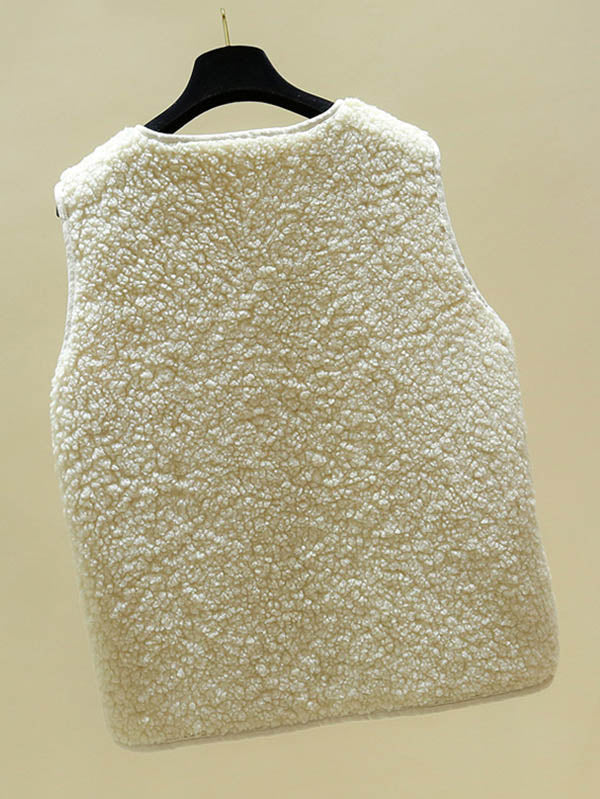 Mouwloos teddy damesgilet met ronde hals en twee opgestikte zakken