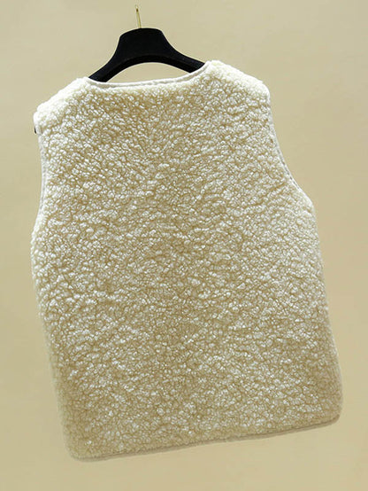 Mouwloos teddy damesgilet met ronde hals en twee opgestikte zakken
