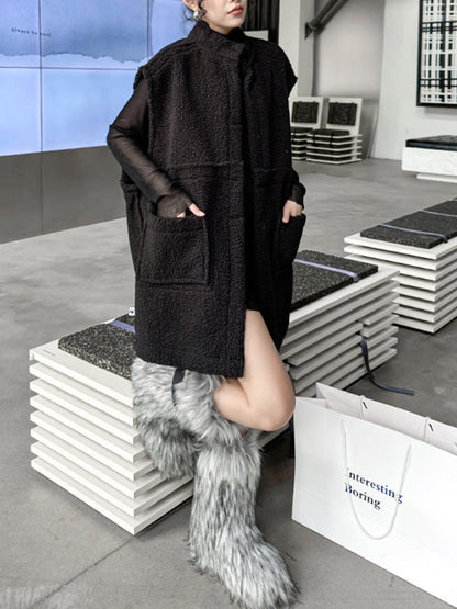 Mouwloos damesgilet in suède look met donkere teddybies