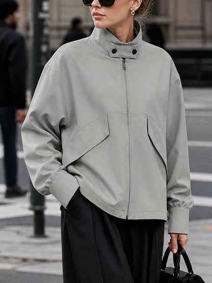 Oversized grijs damesjack met hoge opstaande kraag en rits