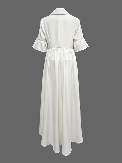 Witte lange damesblouse met volant op de taille en wijde halve mouwen