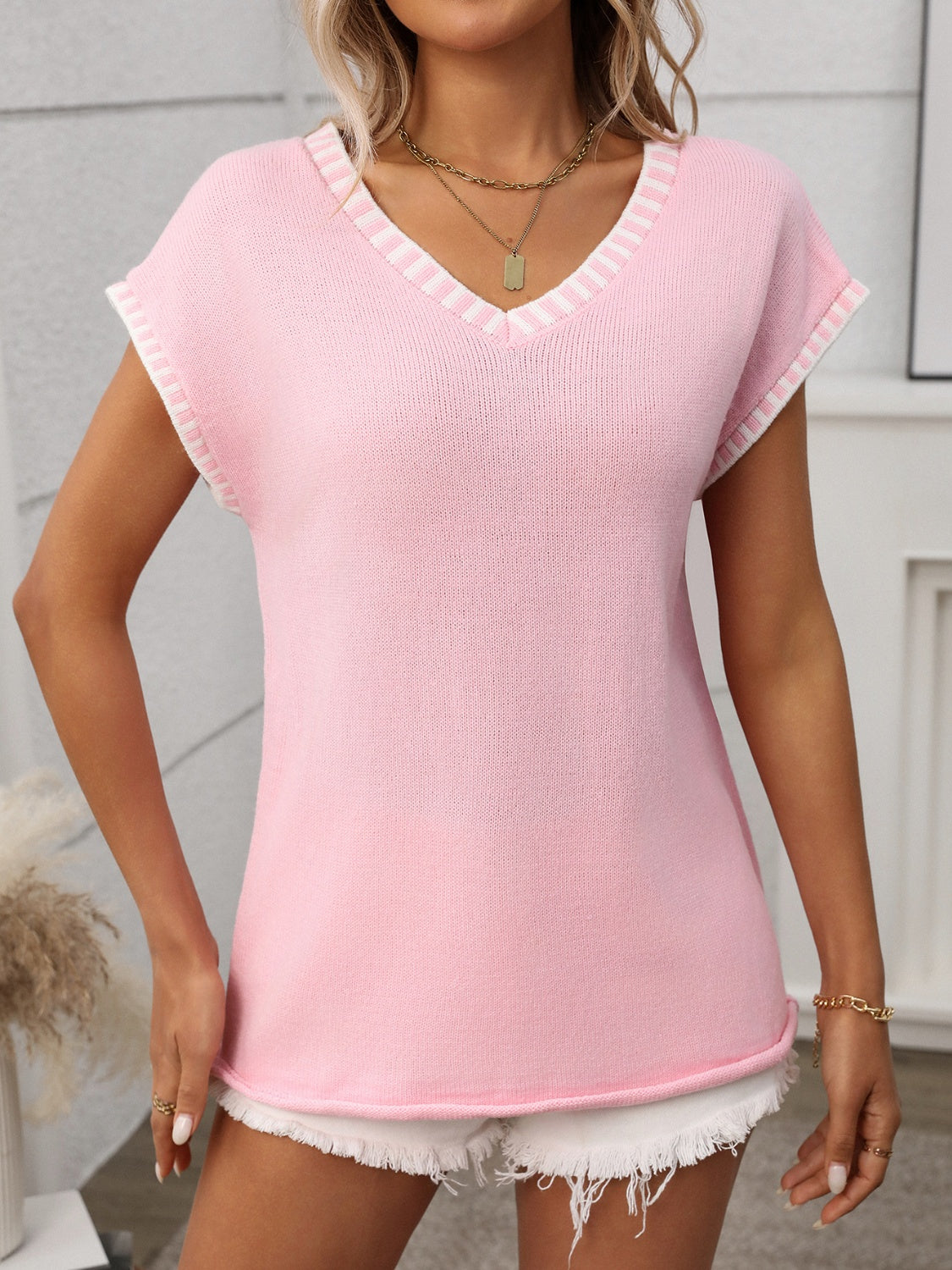 Gebreide top dames met contrastbies - detailfoto