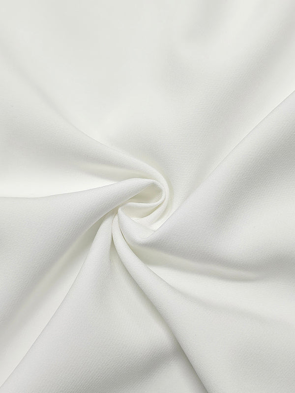 Witte lange damesblouse met volant op de taille en wijde halve mouwen