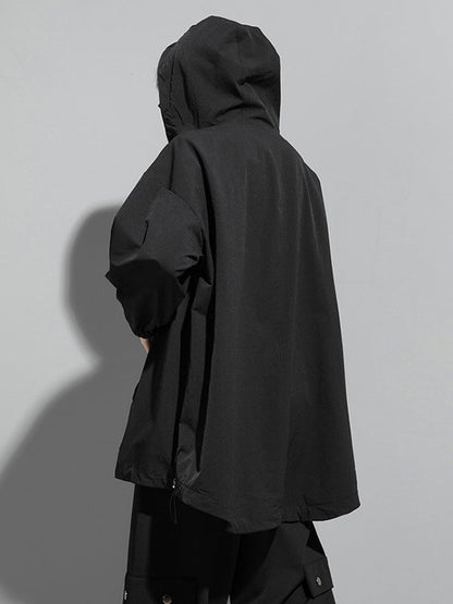 Oversized zwart damesjack met diagonale rits en capuchon