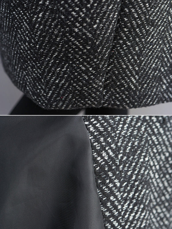 Grijze damesjas met capuchon in visgraat en geribde boorden