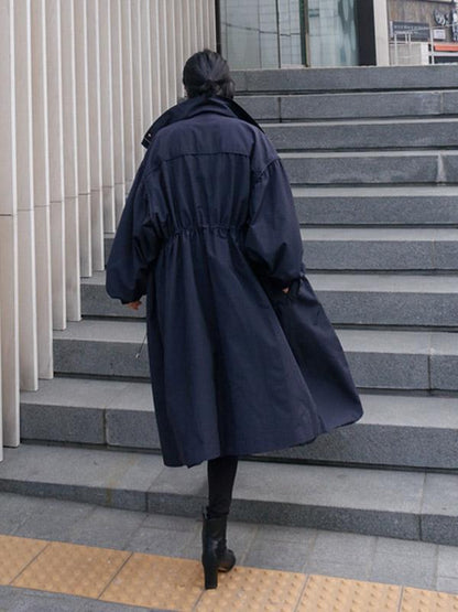 Lange jas dames met capuchon, trekkoord in de taille en diepe zakken