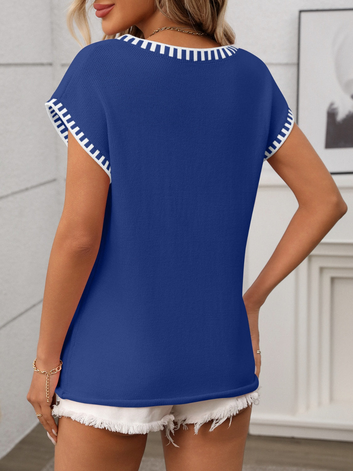 Gebreide top dames met contrastbies - detailfoto