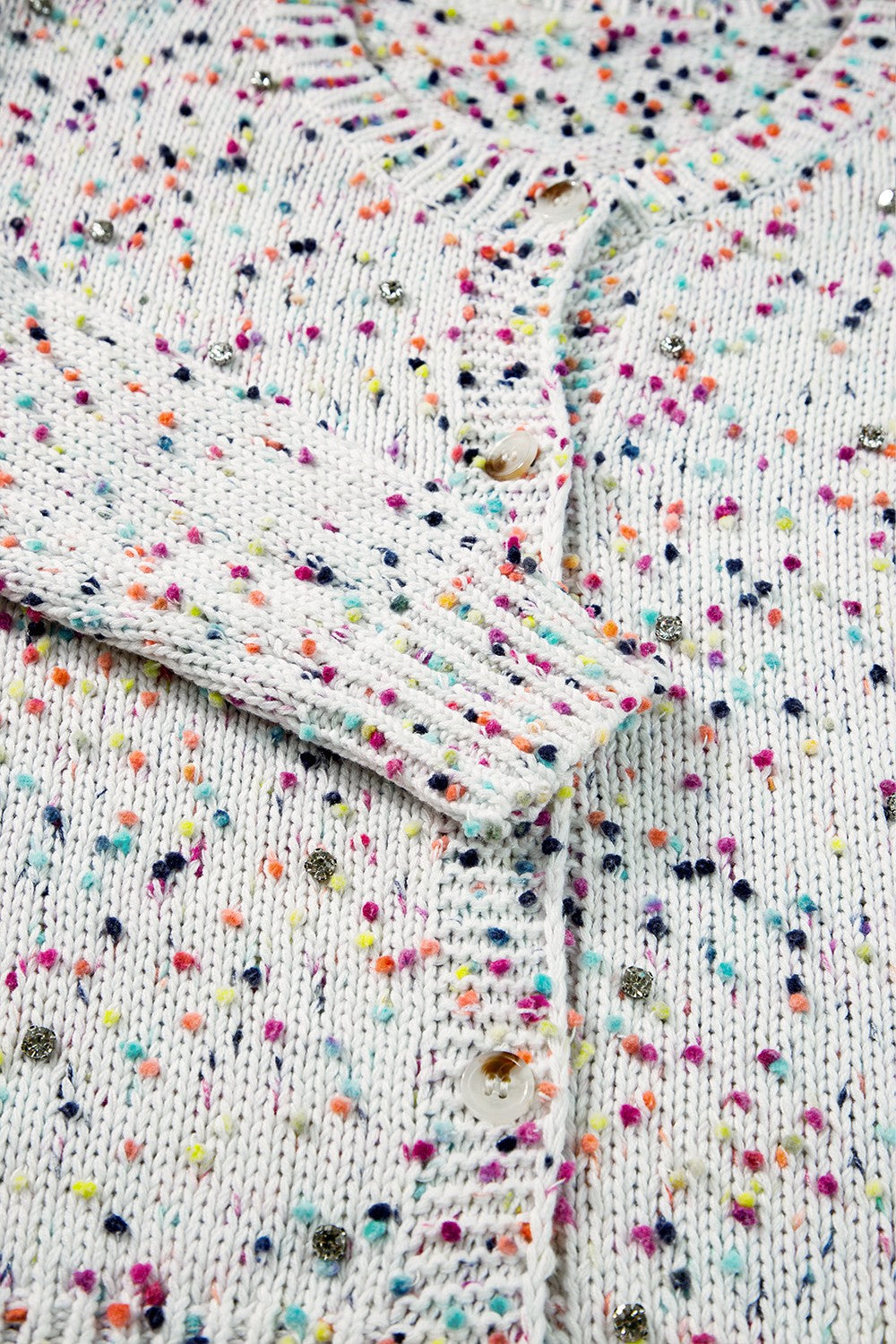 Gespikkeld vest dames met knopen - detailfoto