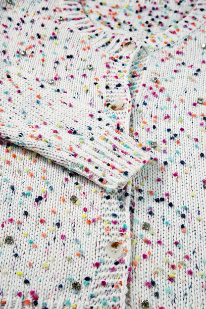 Gespikkeld vest dames met knopen - detailfoto