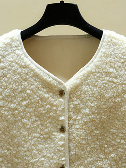 Mouwloos teddy damesgilet met ronde hals en twee opgestikte zakken