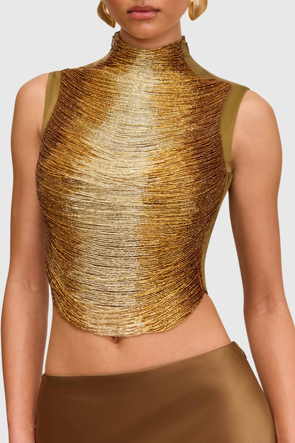 Gouden mouwloze top + jurk met hoge hals en glanzende structuur