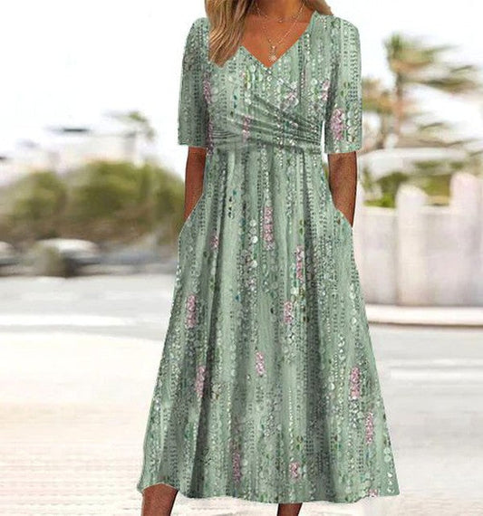 Gebloemde zomerjurk dames in groen - A-lijn silhouet met botanische bloemenprint