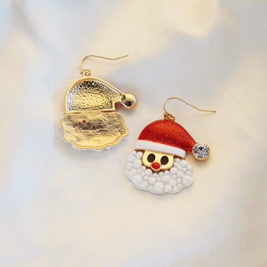 Hangende 3D kerstman oorbellen met rode glittermuts, witte baard en een steentje
