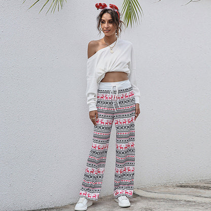 Wijde kerstbroek voor dames met hoge taille, trekkoord en kerstprint - wit met roze-grijze print