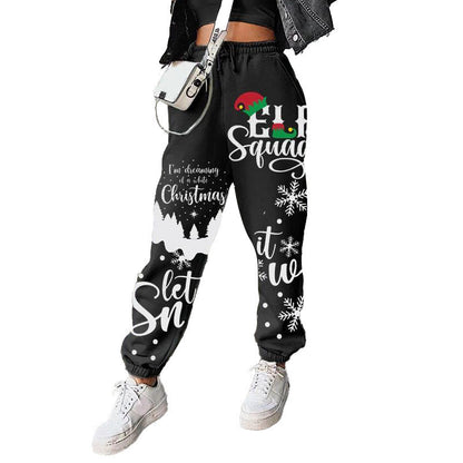 Kerst joggingbroek voor dames met elastische taille en boorden aan de enkels - zwart met kersttekst