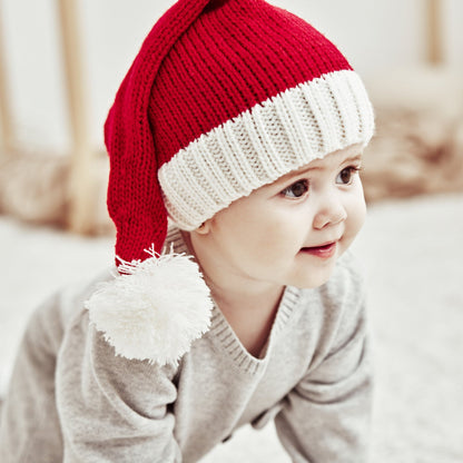 Gebreide rode kerstmuts met witte omslag en pompon, voor ouder en kind
