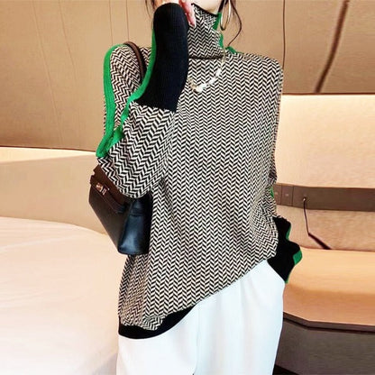 Coltrui dames met zwart-wit zigzagmotief en groene contrastbaan, oversized pasvorm