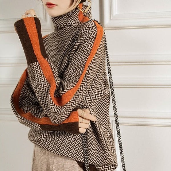 Oversized coltrui dames met oranje contrastbaan en brede mouw, zijaanzicht