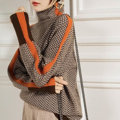Oversized coltrui dames met oranje contrastbaan en brede mouw, zijaanzicht