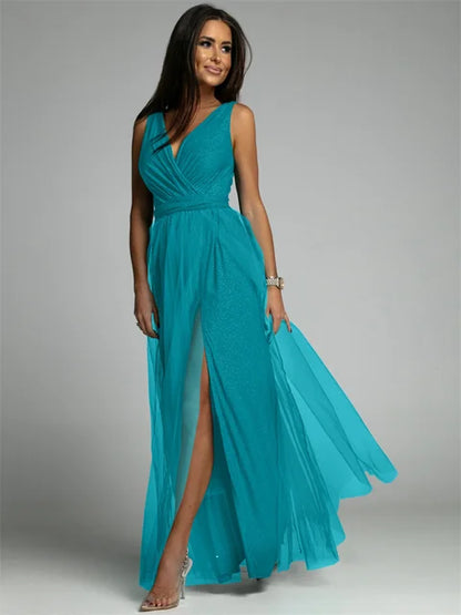 Blauwe maxi jurk met split, mouwloos, overslag V-hals en tule rok