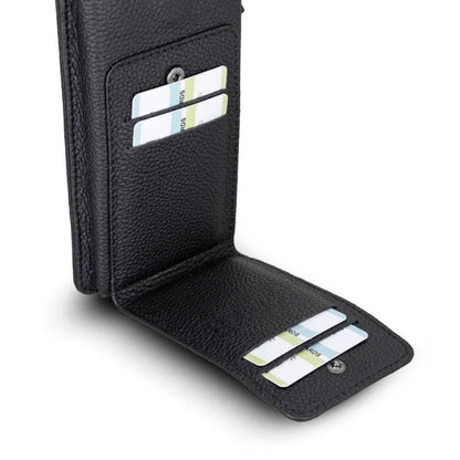 Zwarte leren telefoontas crossbody, close-up van de korrelstructuur