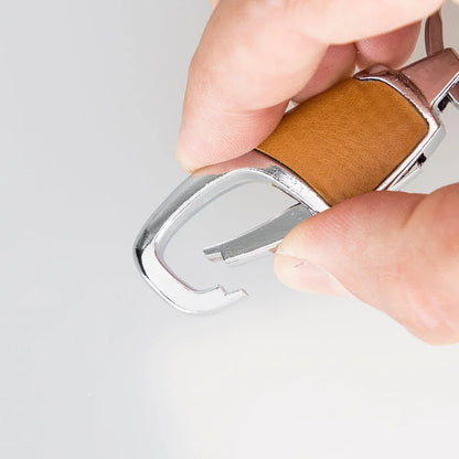 Okerkleurige leren sleutelhanger met karabijnhaak en enkele platte sleutelring