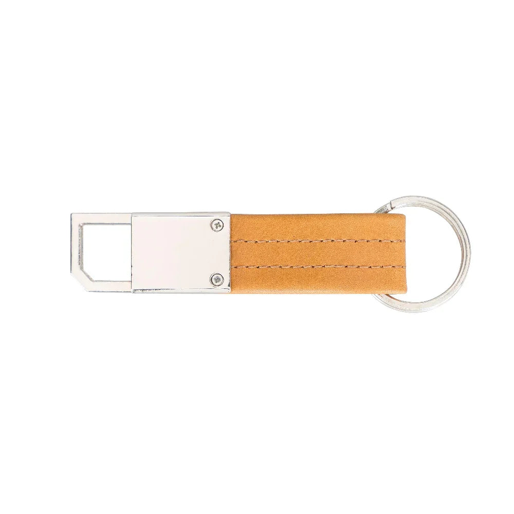 Geopende beugel van de cognac leren sleutelhanger, twee leerlagen in de klem