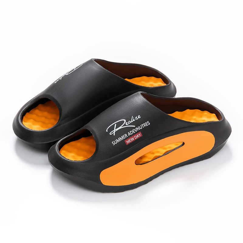 Badslippers van EVA met golvend voetbed in contrastkleur en dikke zool - zwart / oranje