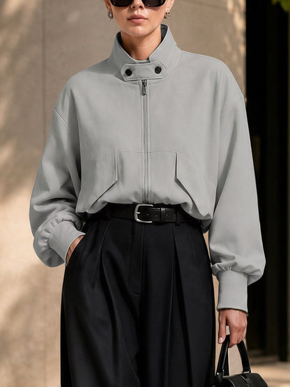 Oversized grijs damesjack met hoge opstaande kraag en rits