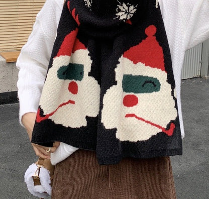 Brede gebreide kerstsjaal met grote kerstmanhoofden aan de uiteinden - zwart