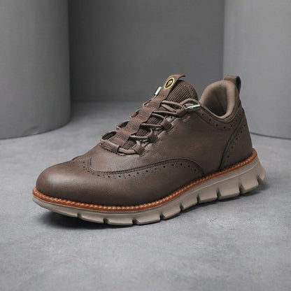 Brogue herensneakers in gladde leerlook met elastische veters door lusjes en profielzool - grijsbruin