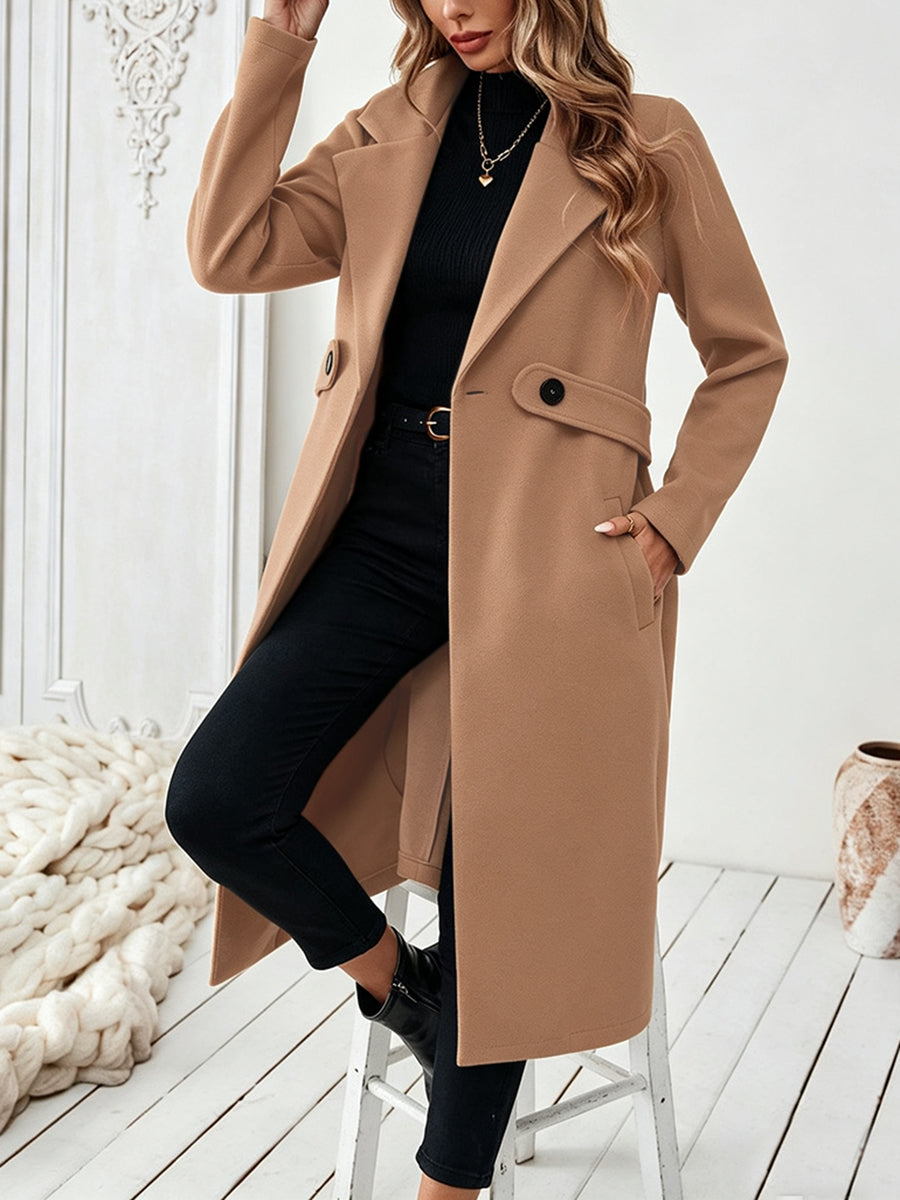 Lange mantel dames met brede revers en een knoop op de taille
