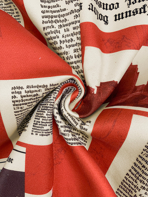 Damesblazer met krantenkolommen in rood en crème