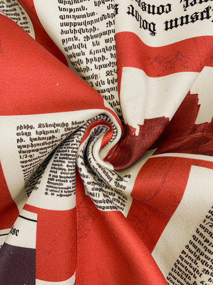 Damesblazer met krantenkolommen in rood en crème