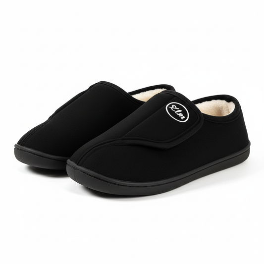Brede unisex sloffen in suède look met klittenband en fleecevoering - zwart